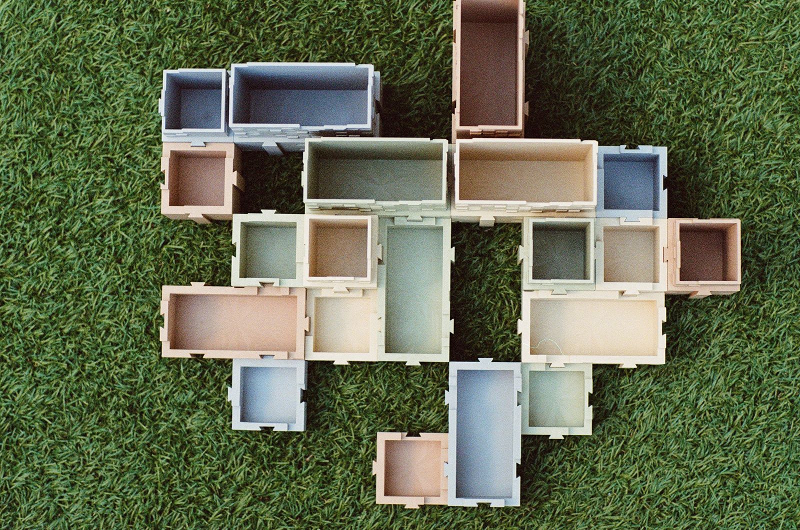 Organiser modules laid out as a grid on grass