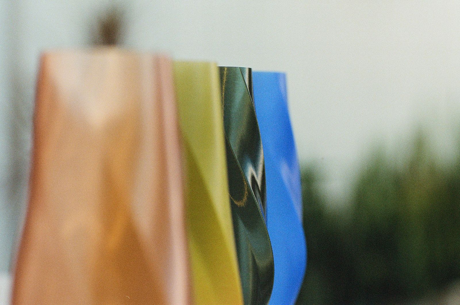 Peach, gradient, green and blue vases, close